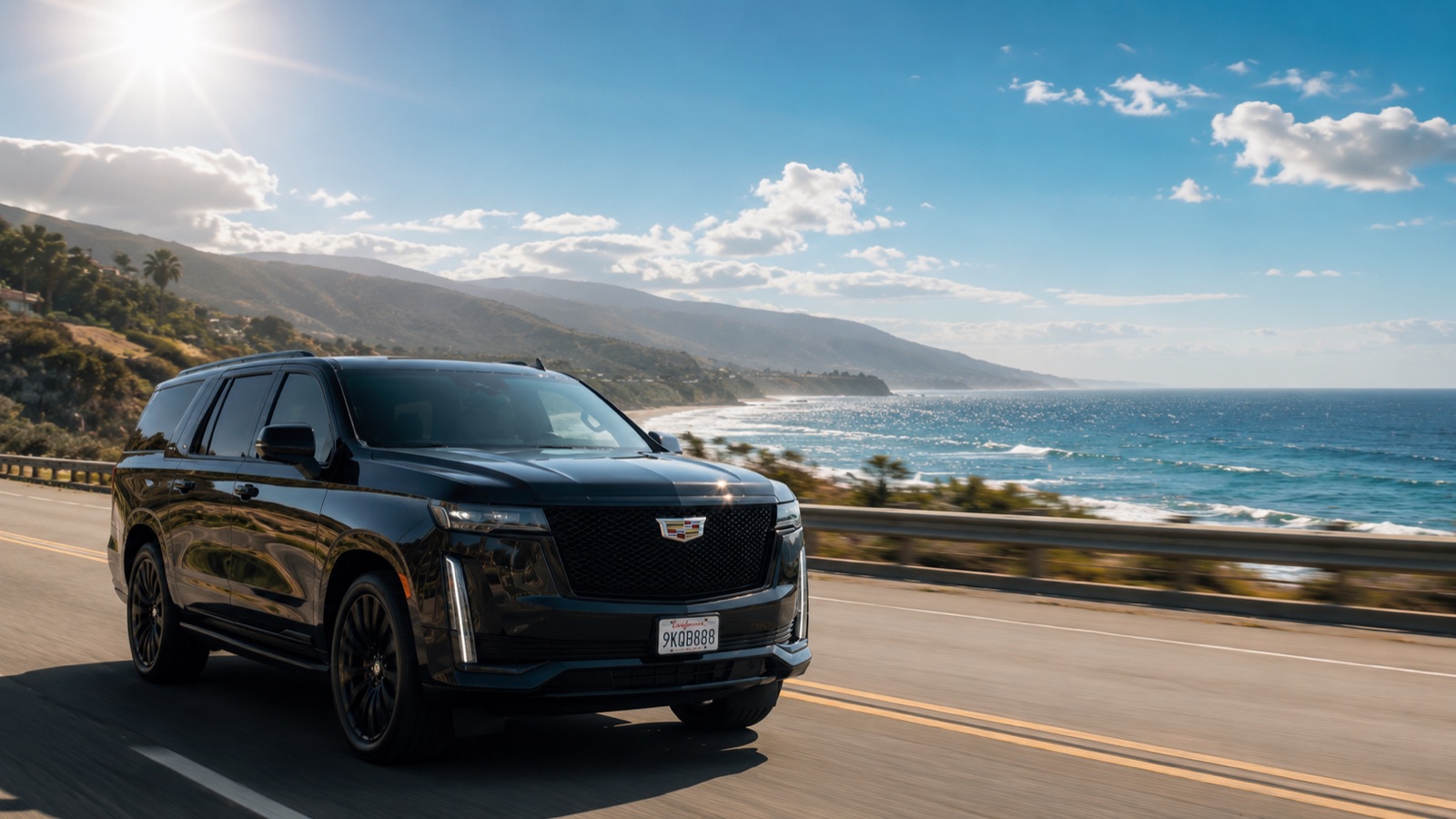 Black Cadillac Escalade on the Pacific Coast Highway above the ocean